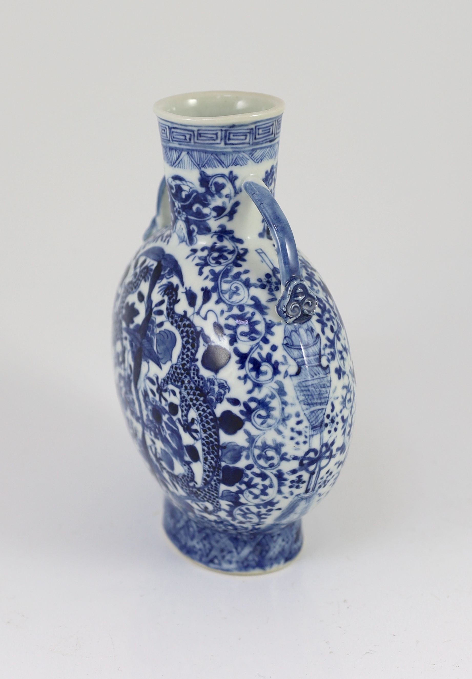 A Chinese blue and white ‘dragon’ moon flask, late 18th century, 20cm high